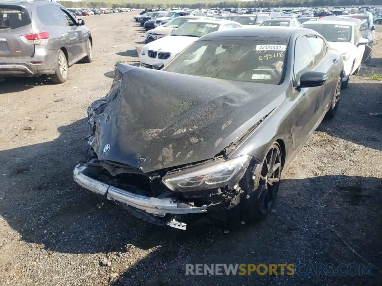 2 Photograph of a damaged car WBAGV8C09MCE95118 BMW M8 2021