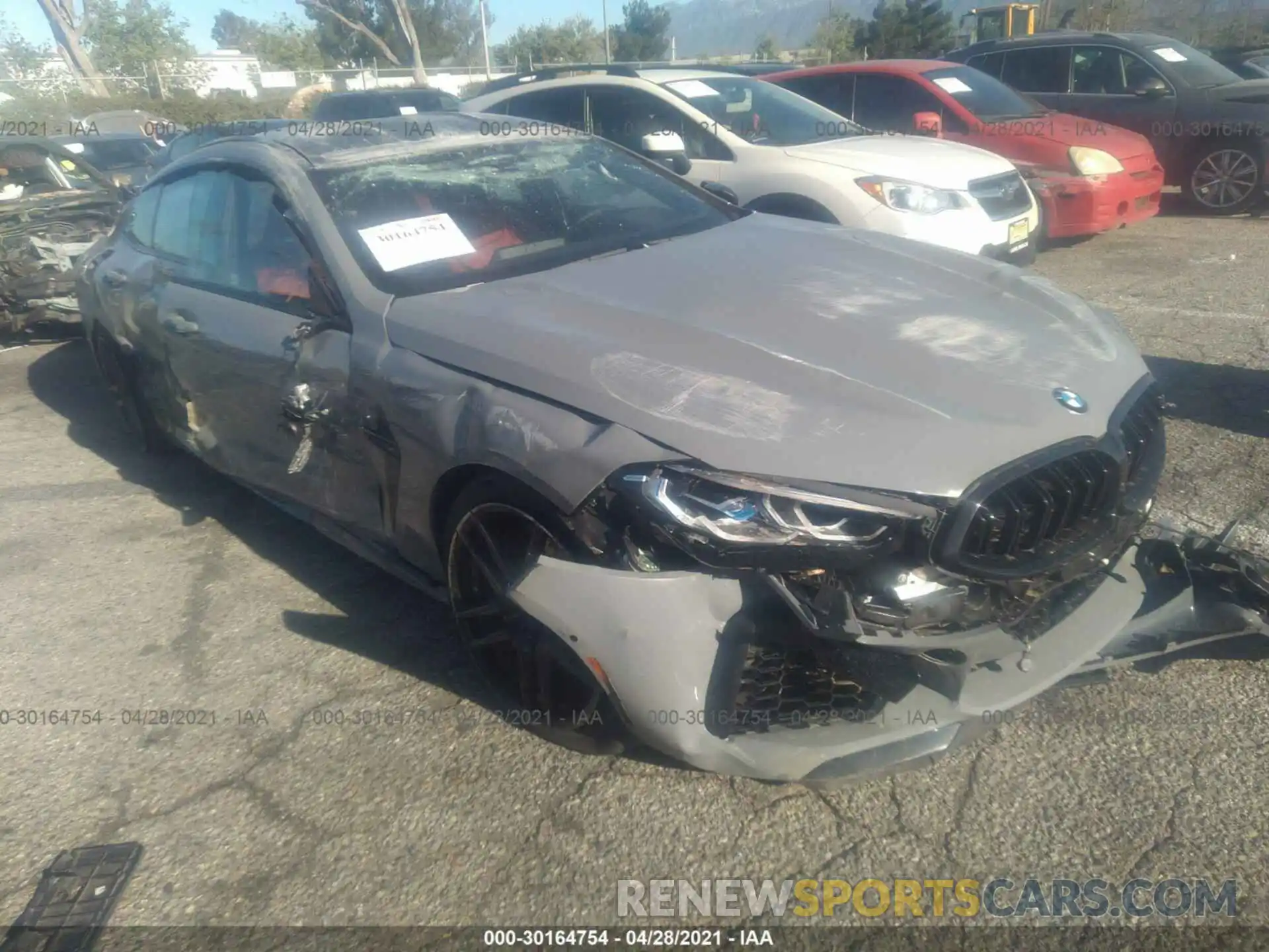 1 Photograph of a damaged car WBSGV0C01MCG28807 BMW M8 2021