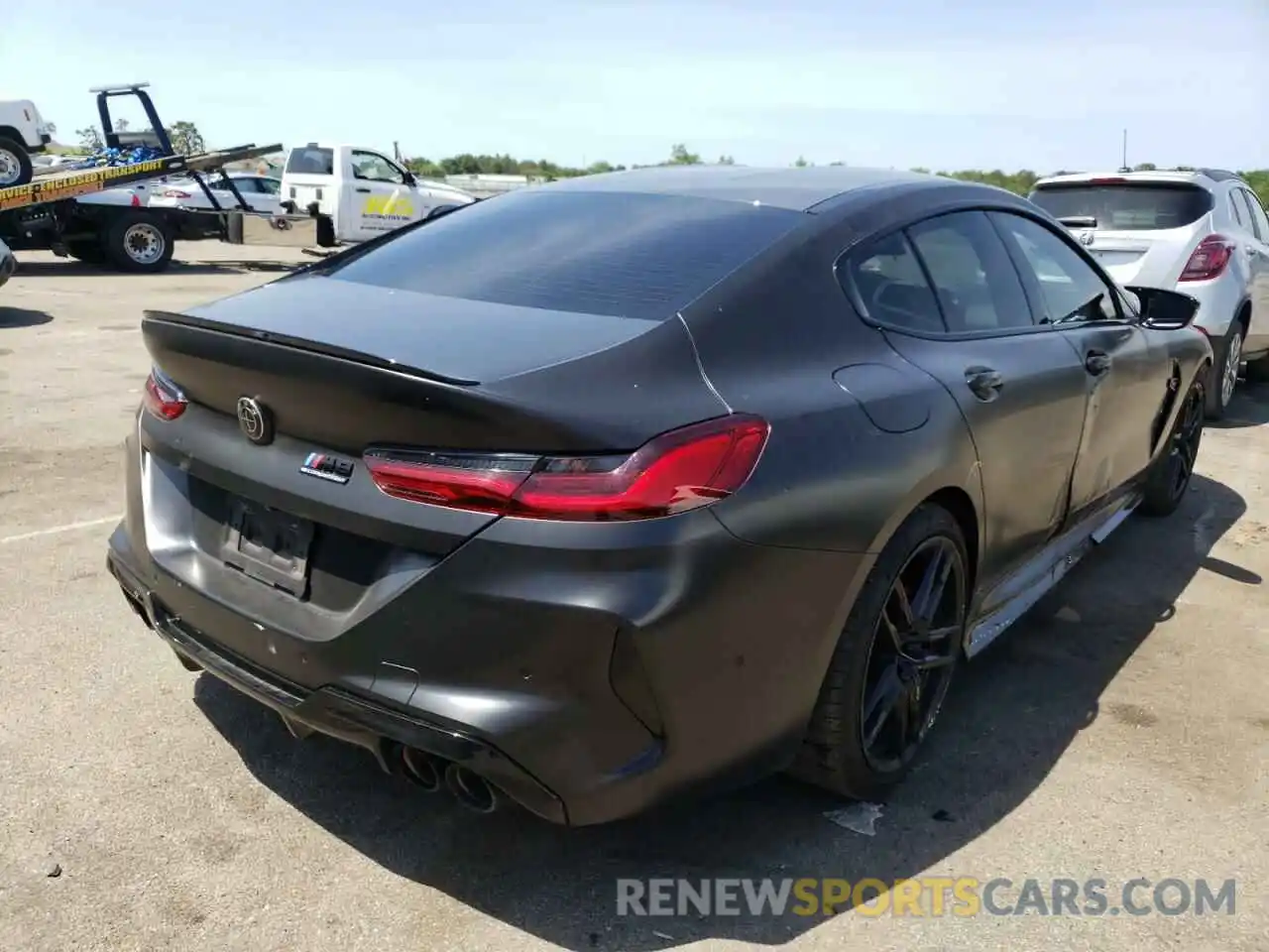 4 Photograph of a damaged car WBSGV0C03MCF31589 BMW M8 2021