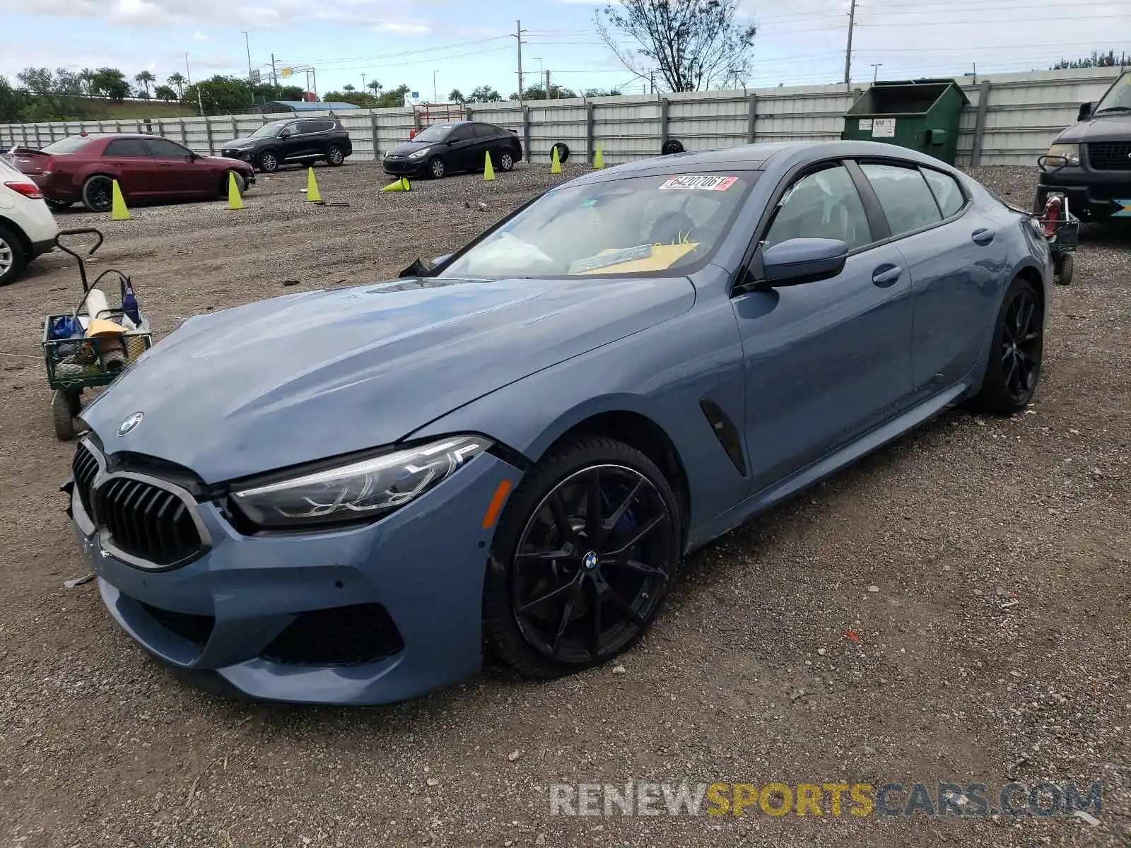 2 Photograph of a damaged car WBAGV8C01NCH15286 BMW M8 2022