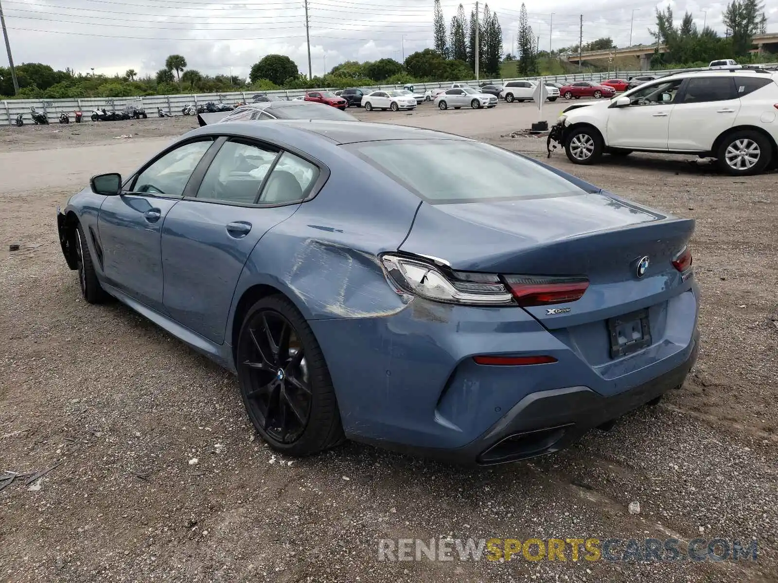 3 Photograph of a damaged car WBAGV8C01NCH15286 BMW M8 2022