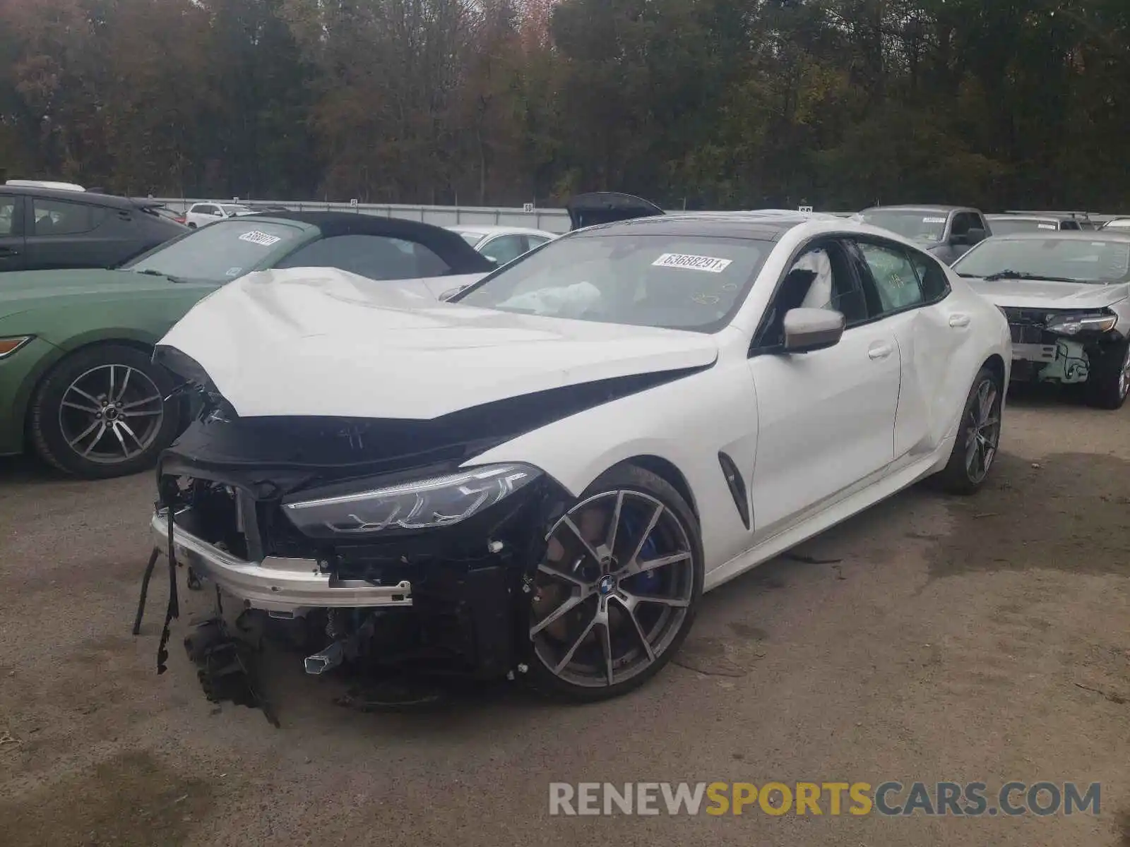 2 Photograph of a damaged car WBAGV8C05NCH67679 BMW M8 2022