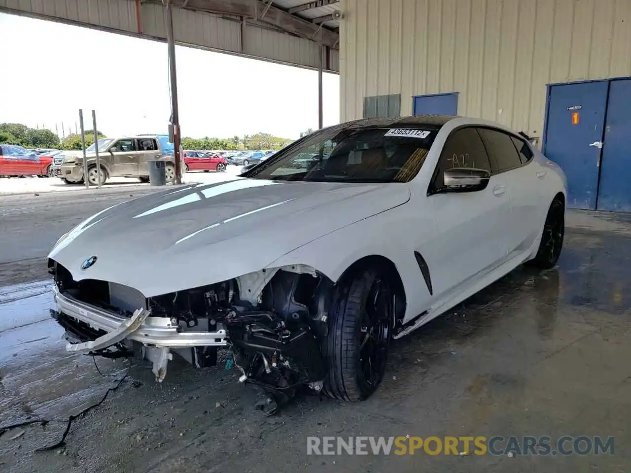 2 Photograph of a damaged car WBAGV8C06NCH65746 BMW M8 2022