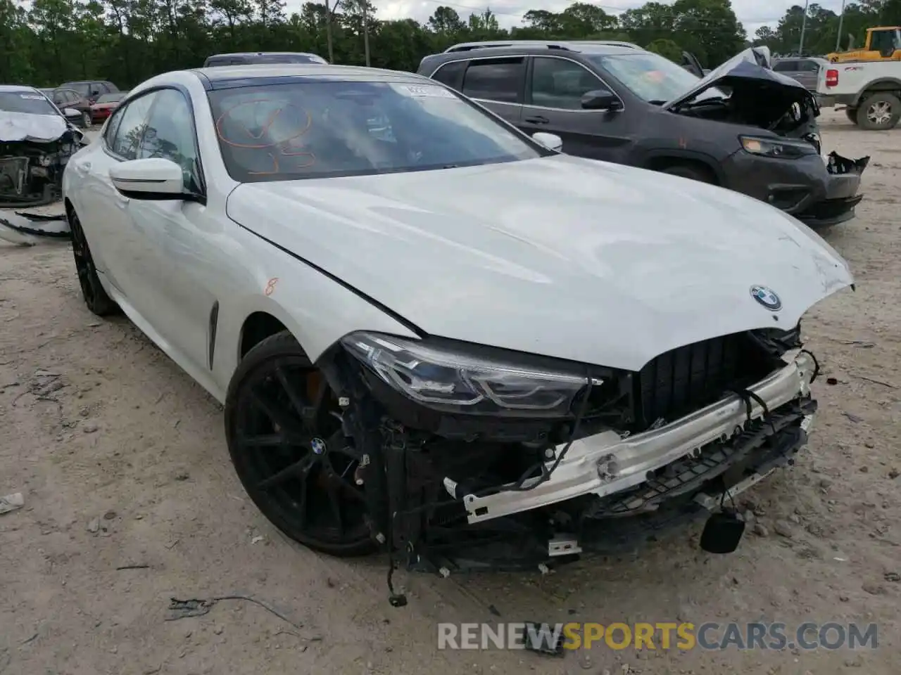 1 Photograph of a damaged car WBAGV8C08NCH43652 BMW M8 2022