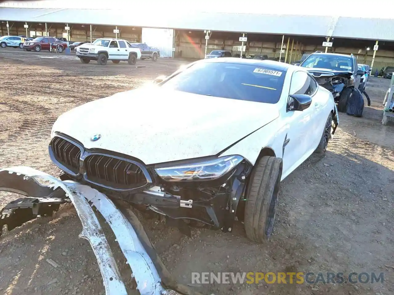 2 Photograph of a damaged car WBSAE0C02NCH14215 BMW M8 2022