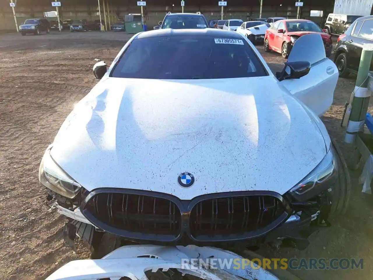 7 Photograph of a damaged car WBSAE0C02NCH14215 BMW M8 2022