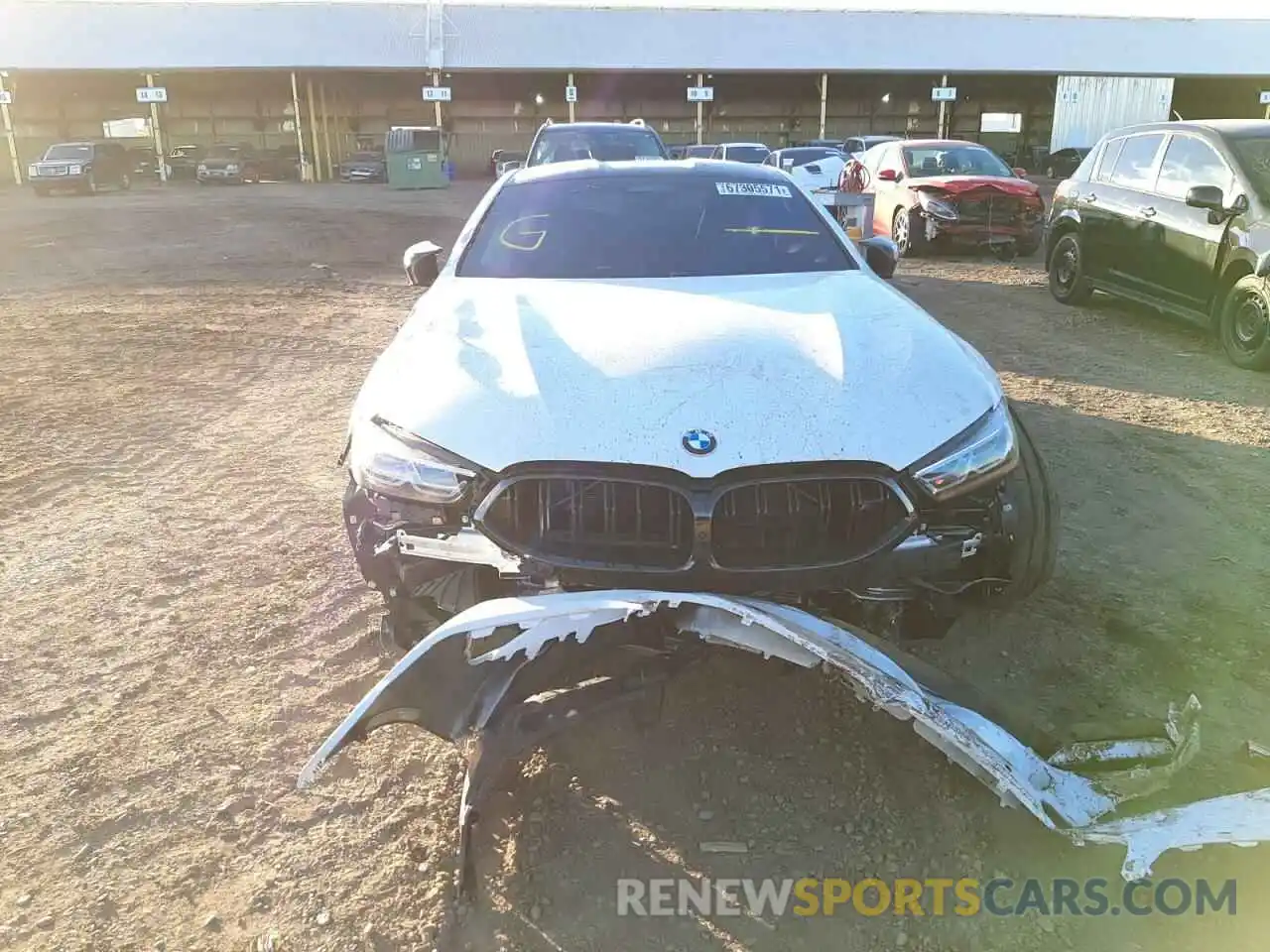 9 Photograph of a damaged car WBSAE0C02NCH14215 BMW M8 2022