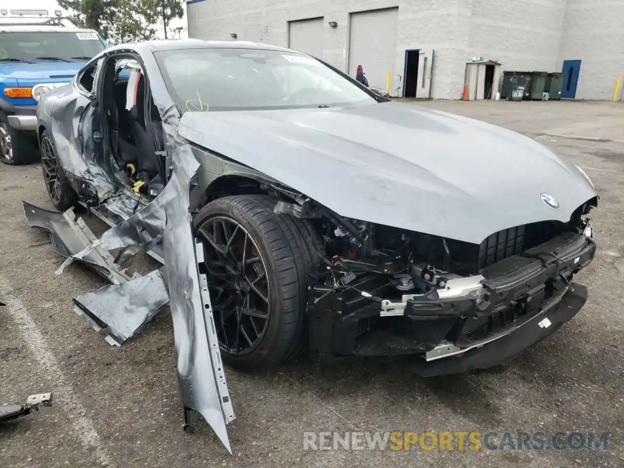 1 Photograph of a damaged car WBSAE0C05NCJ08095 BMW M8 2022