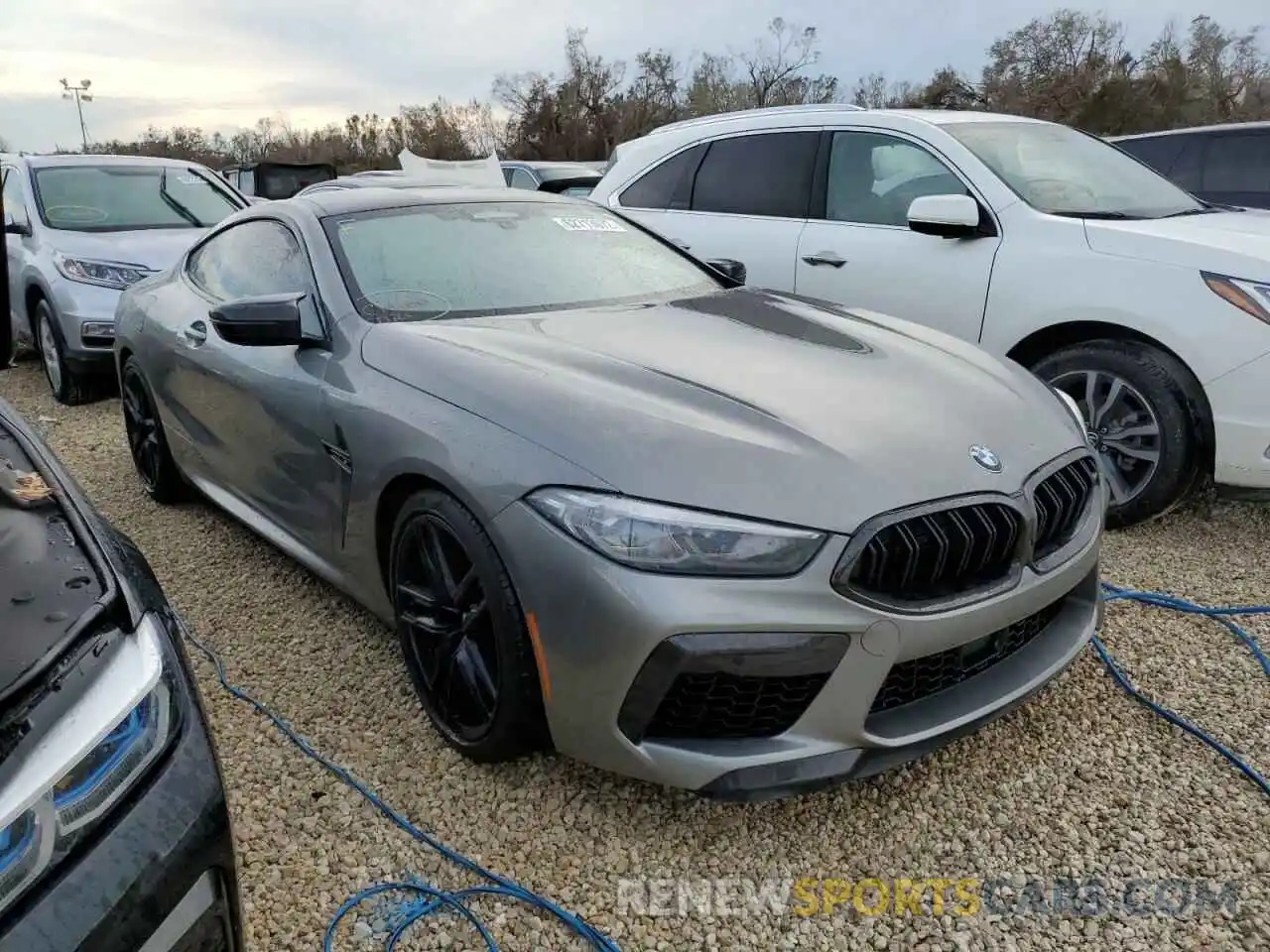 1 Photograph of a damaged car WBSAE0C08NCH30659 BMW M8 2022