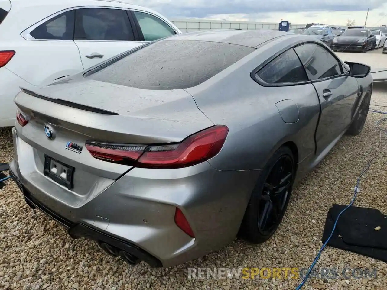 4 Photograph of a damaged car WBSAE0C08NCH30659 BMW M8 2022