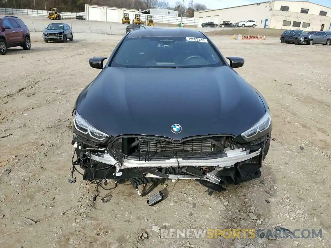 5 Photograph of a damaged car WBSGV0C02NCJ32655 BMW M8 2022