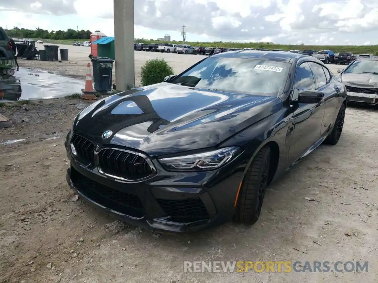 2 Photograph of a damaged car WBSGV0C05NCJ22668 BMW M8 2022