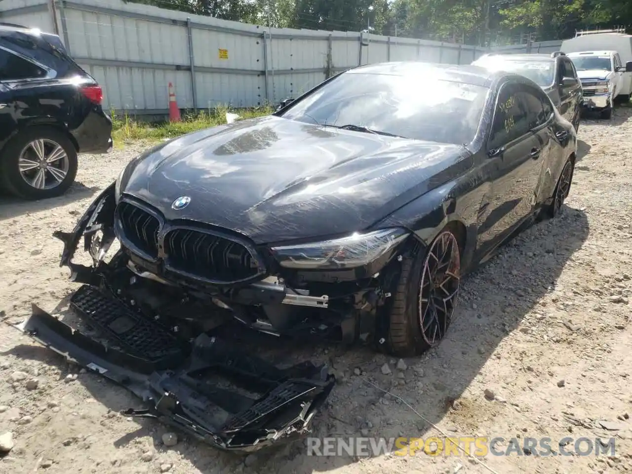 2 Photograph of a damaged car WBSGV0C07NCJ05497 BMW M8 2022