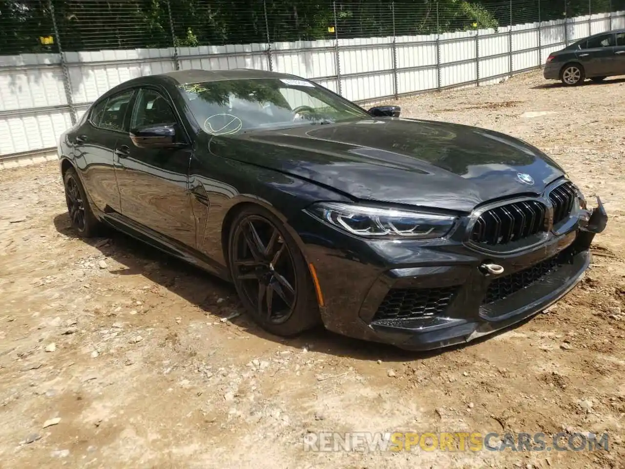 1 Photograph of a damaged car WBSGV0C0XNCH05532 BMW M8 2022