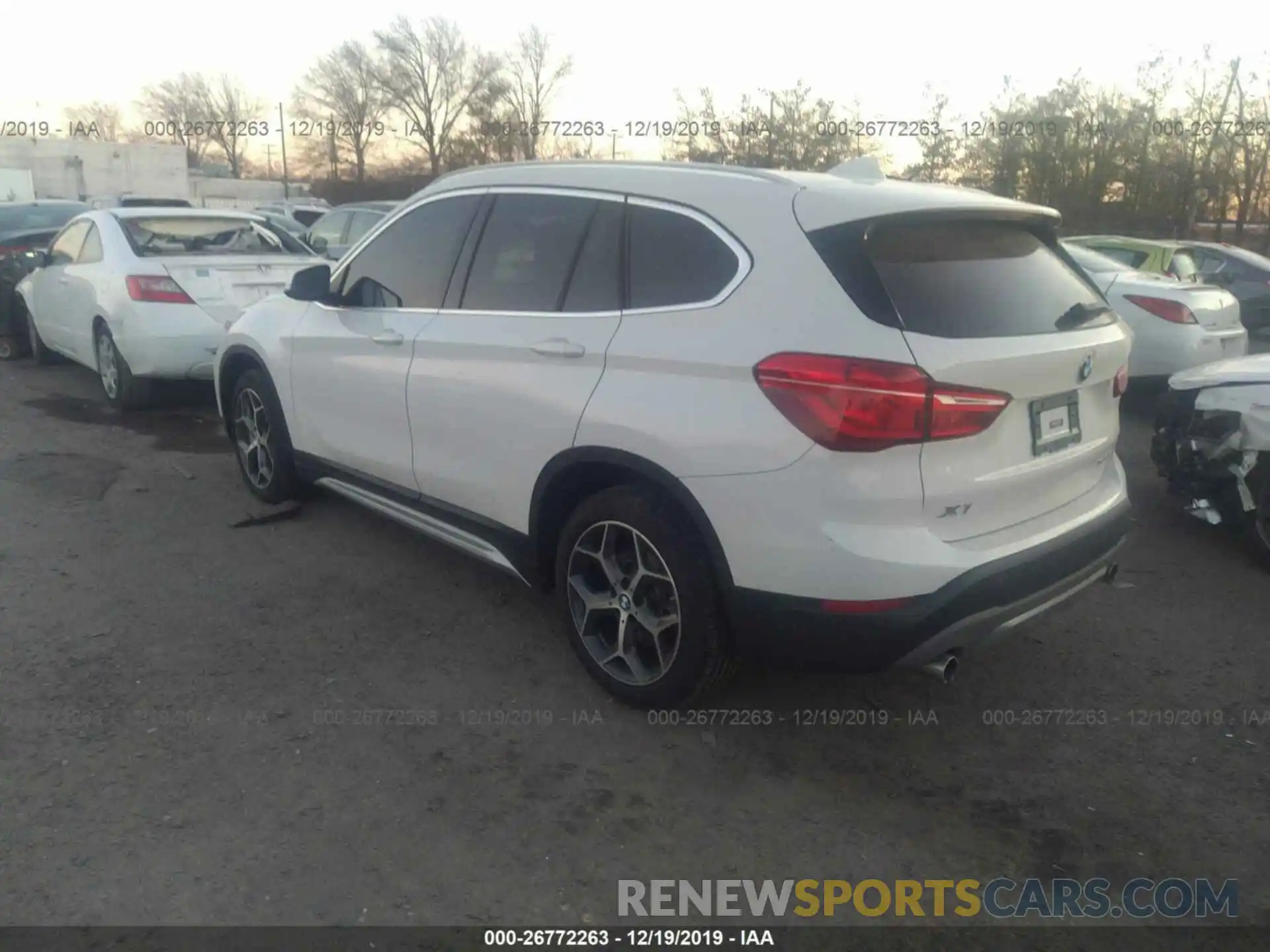 3 Photograph of a damaged car WBXHT3C51K5L90859 BMW X1 2019