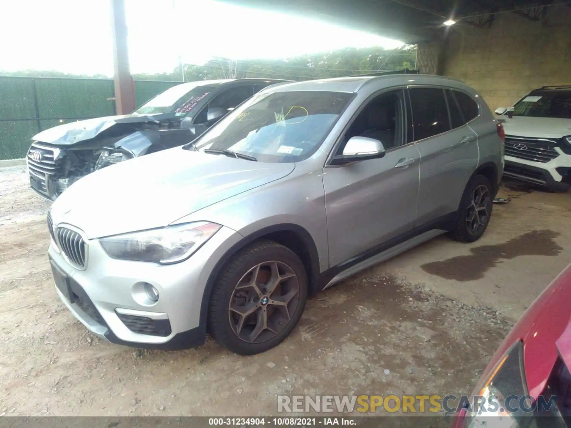 2 Photograph of a damaged car WBXHT3C53K3H35453 BMW X1 2019