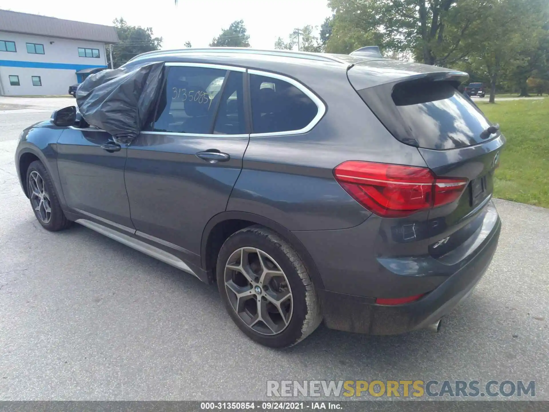 3 Photograph of a damaged car WBXHT3C55K3H36815 BMW X1 2019