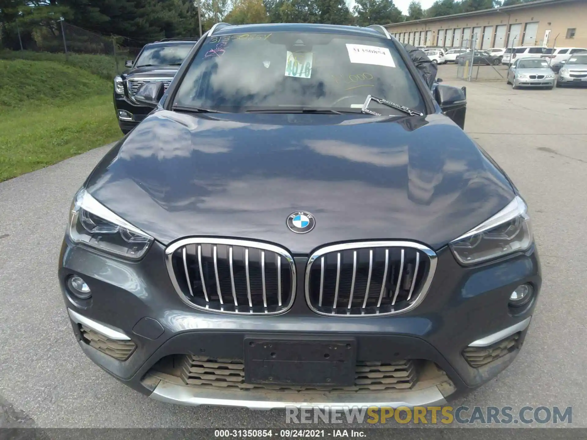 6 Photograph of a damaged car WBXHT3C55K3H36815 BMW X1 2019