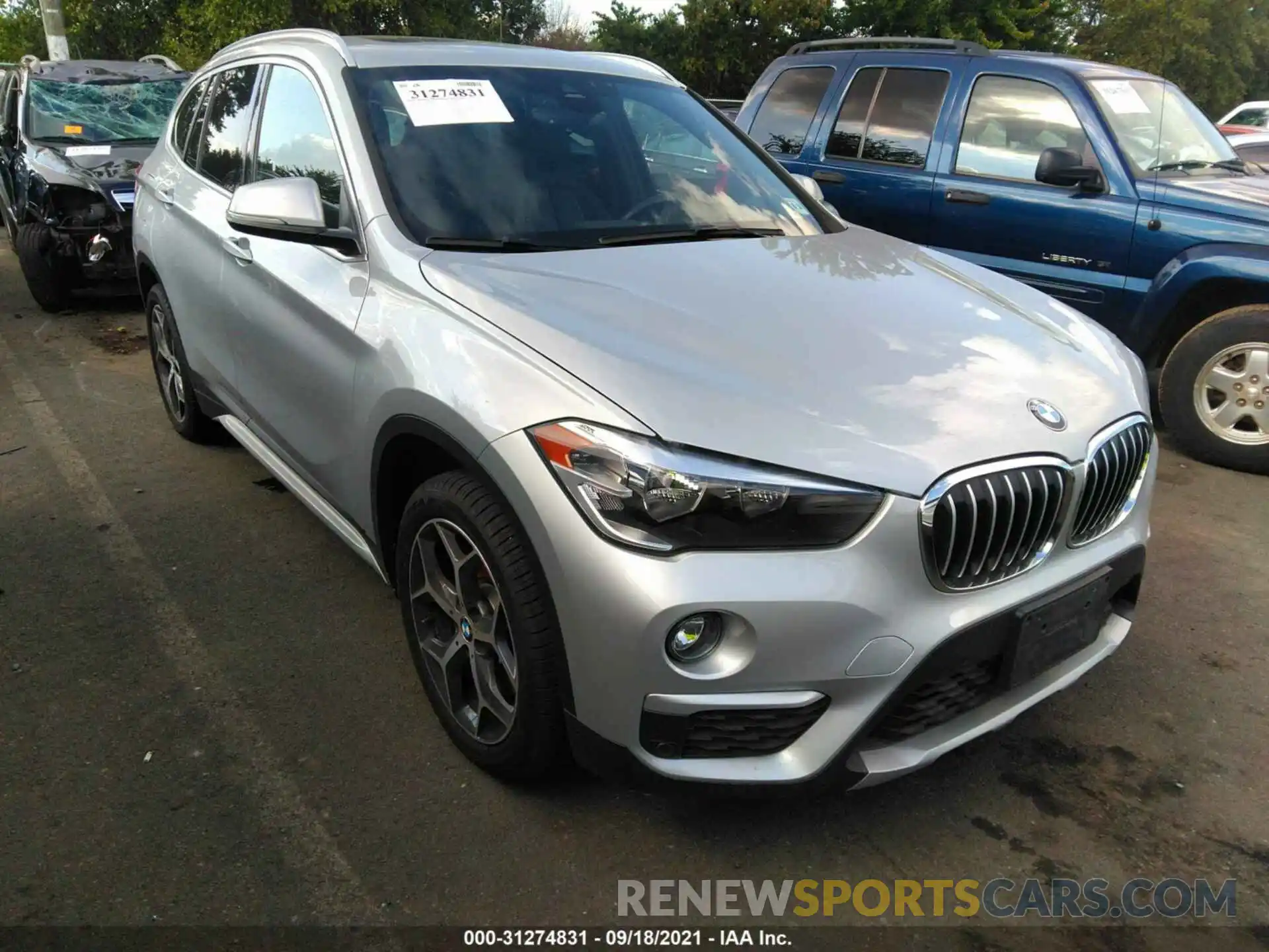 1 Photograph of a damaged car WBXHT3C55K5L38652 BMW X1 2019