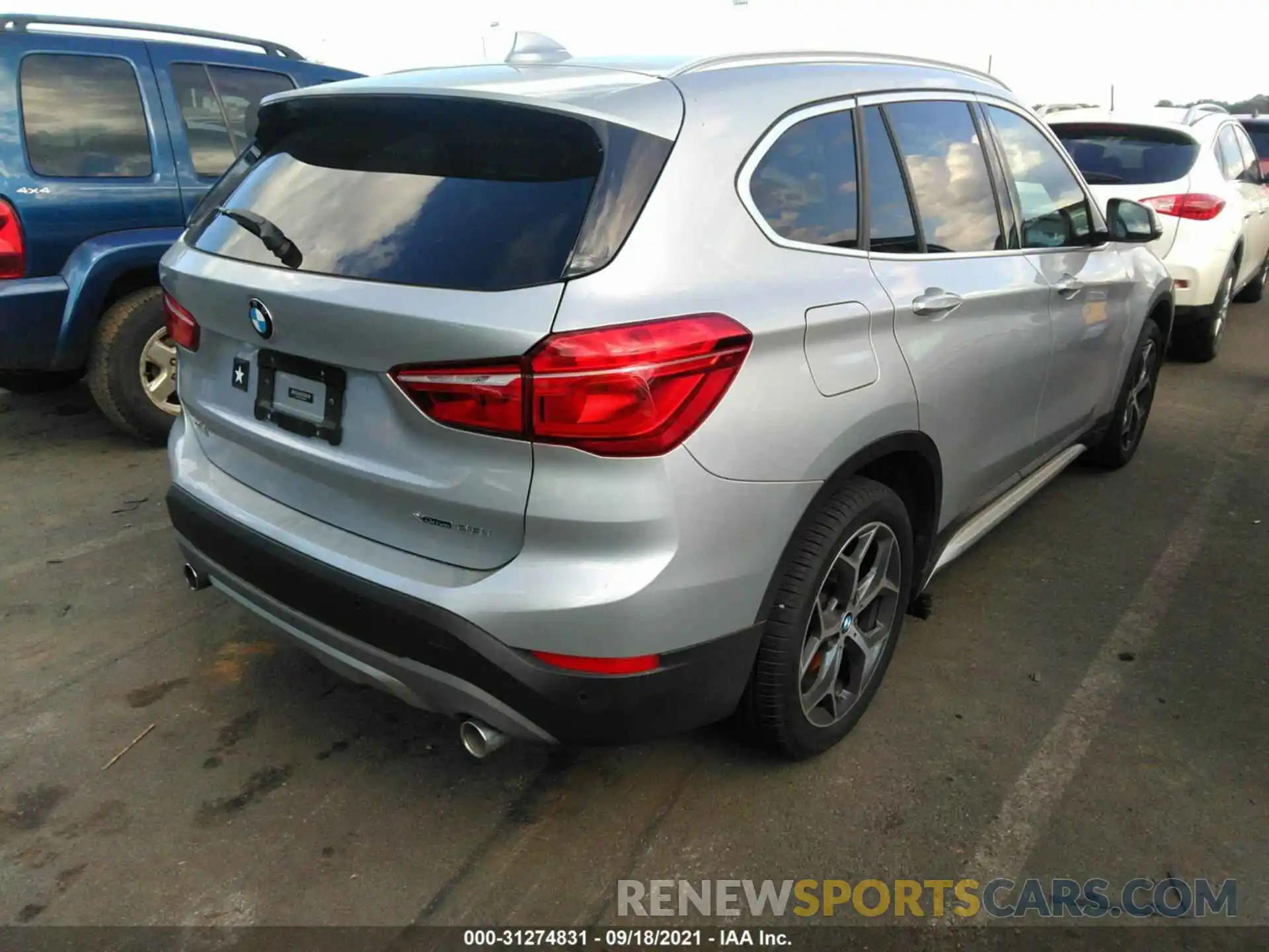 4 Photograph of a damaged car WBXHT3C55K5L38652 BMW X1 2019