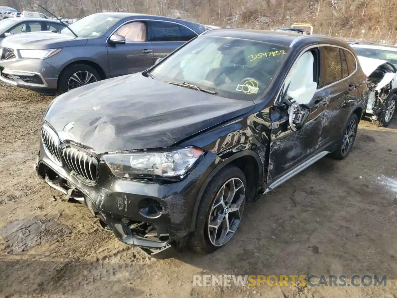 2 Photograph of a damaged car WBXHT3C56K5L36411 BMW X1 2019