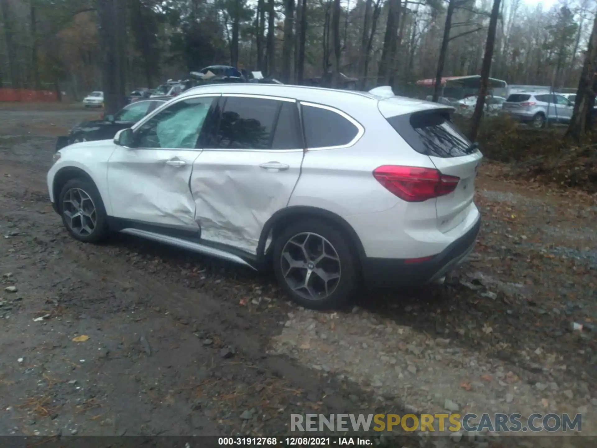 3 Photograph of a damaged car WBXHT3C57K5L36823 BMW X1 2019