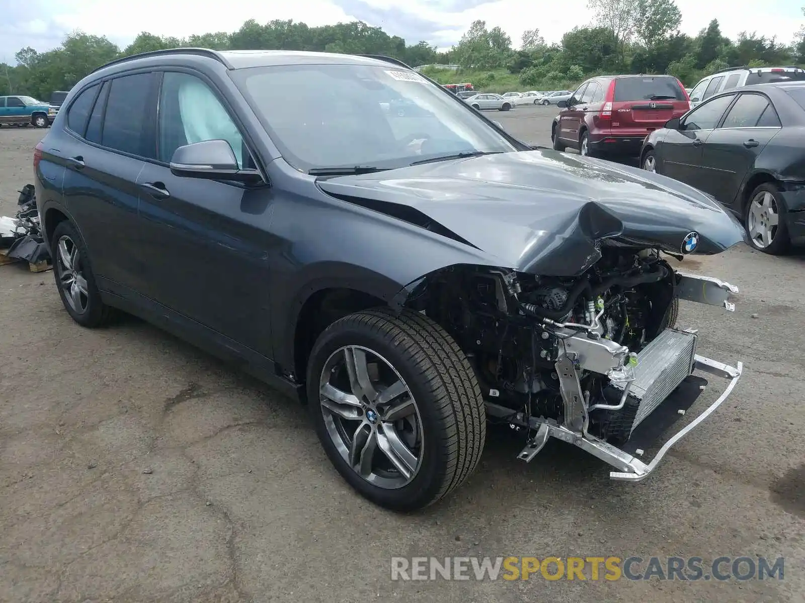 1 Photograph of a damaged car WBXHT3C58K3H34640 BMW X1 2019