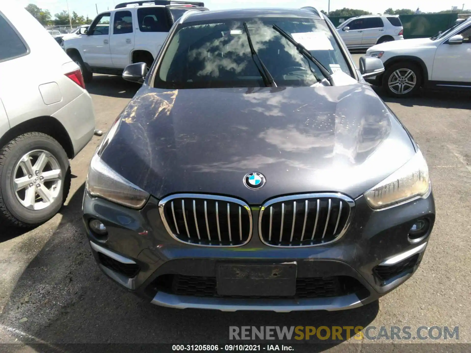 6 Photograph of a damaged car WBXHT3C59K3H34422 BMW X1 2019