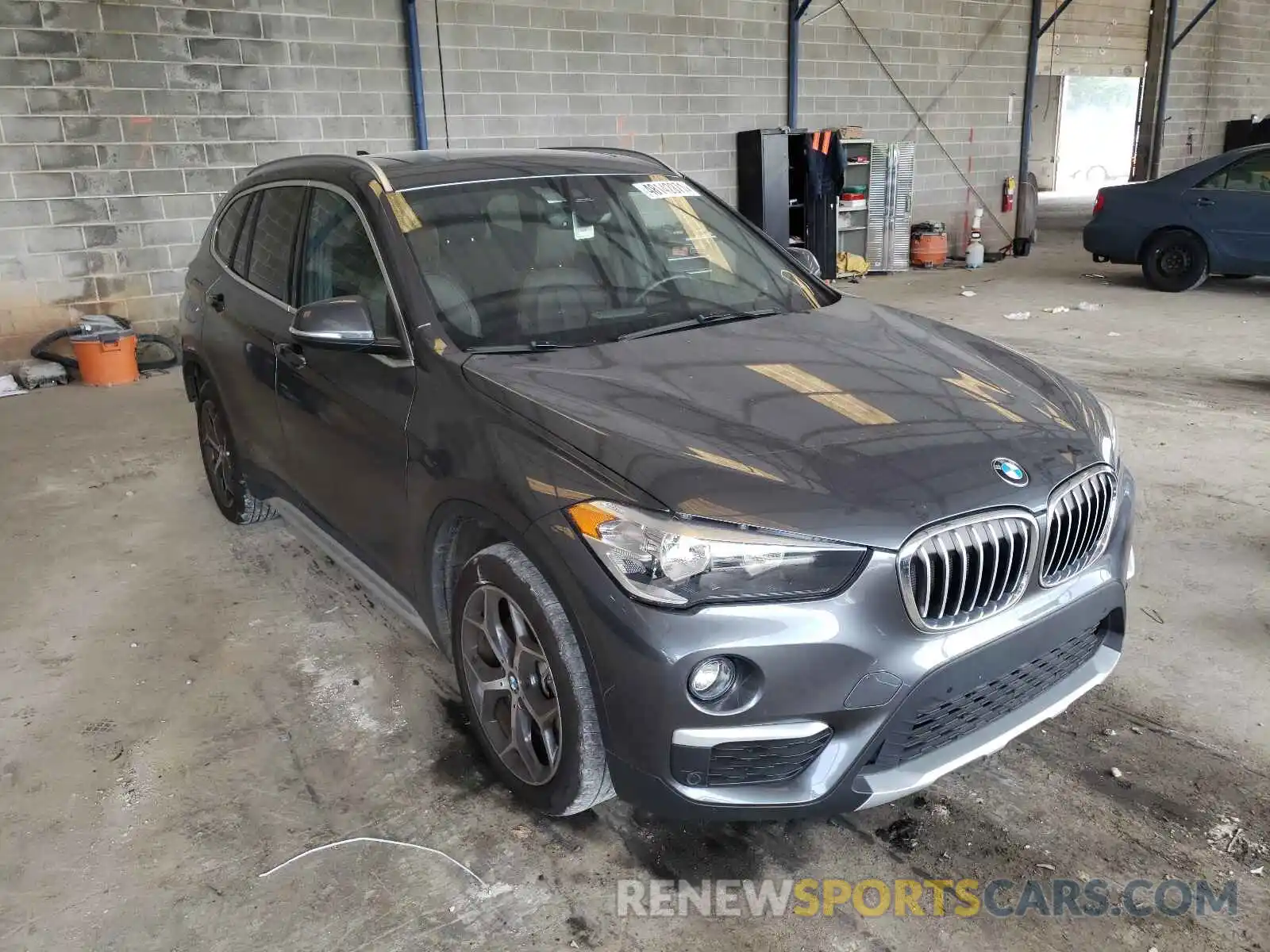 1 Photograph of a damaged car WBXHU7C50K3H44454 BMW X1 2019