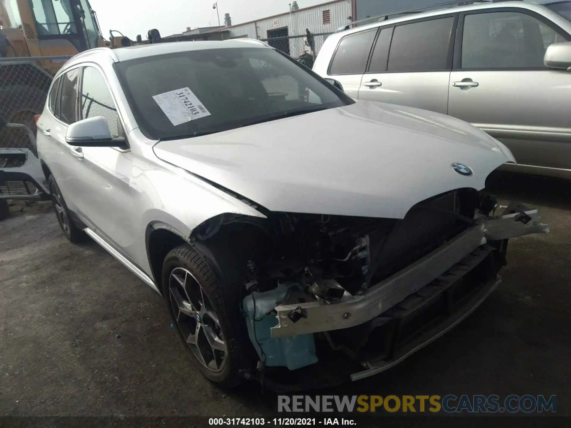 1 Photograph of a damaged car WBXHU7C52K5L11512 BMW X1 2019