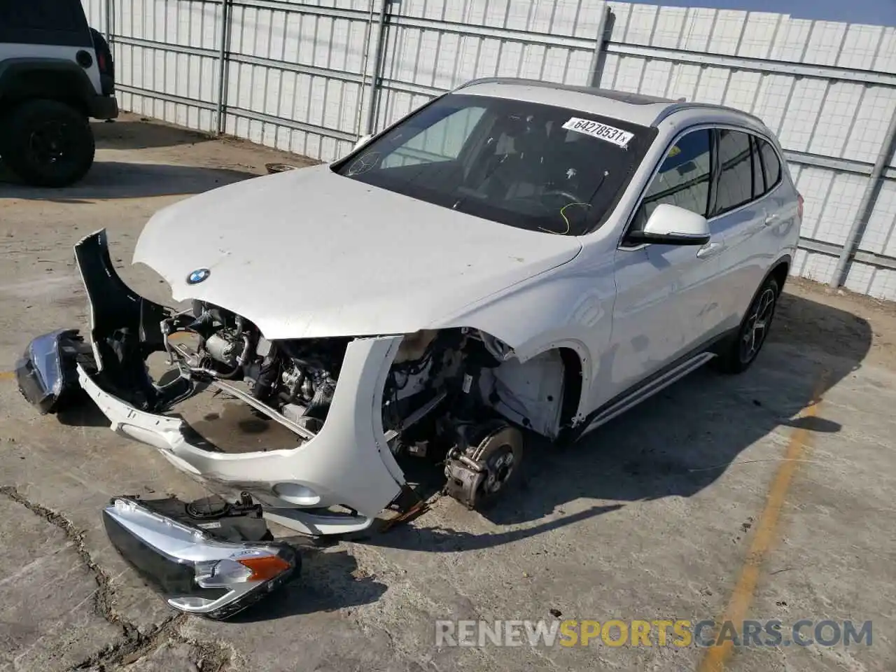 2 Photograph of a damaged car WBXHU7C53K3H46571 BMW X1 2019