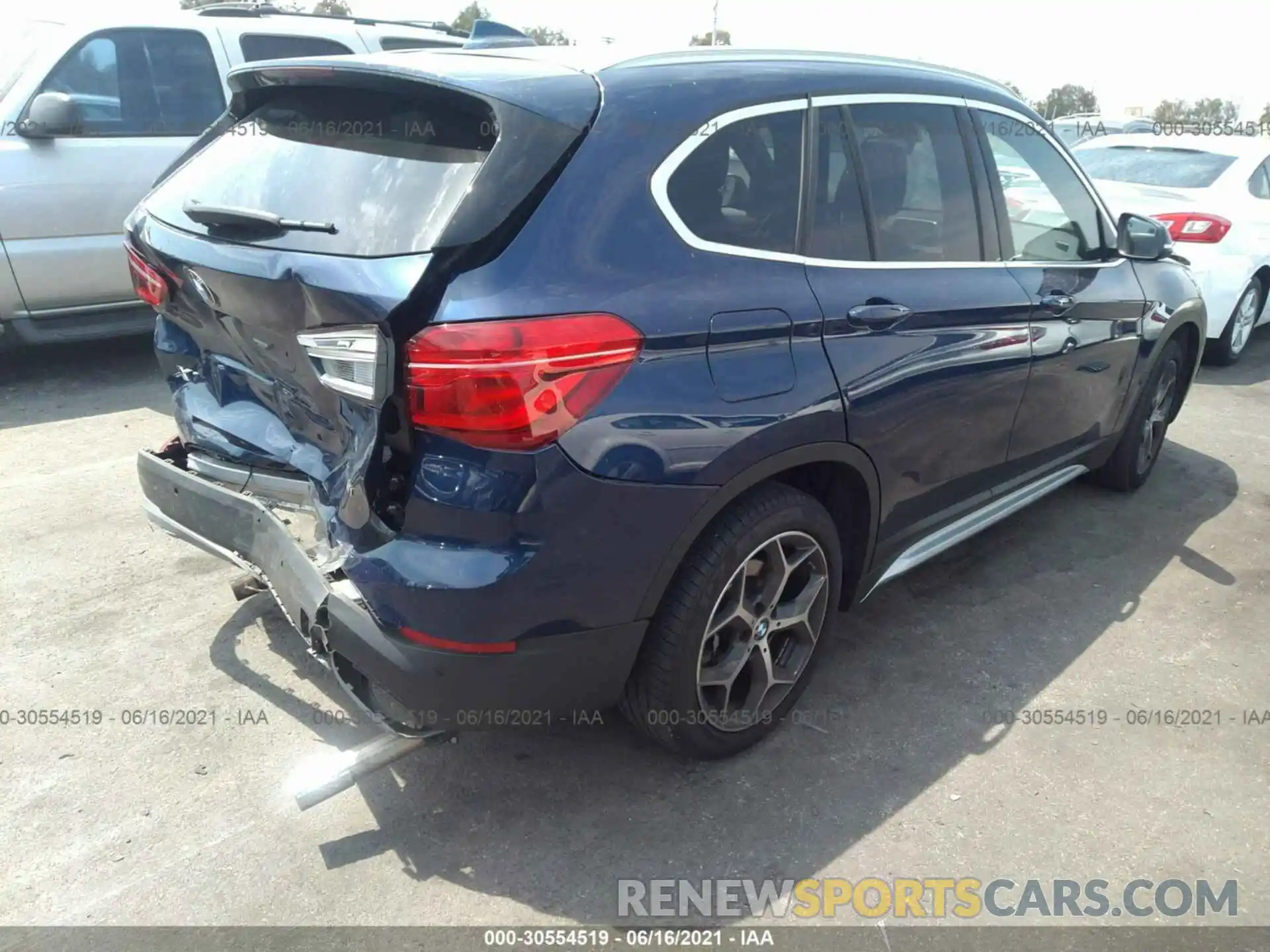 4 Photograph of a damaged car WBXHU7C53K5L10532 BMW X1 2019