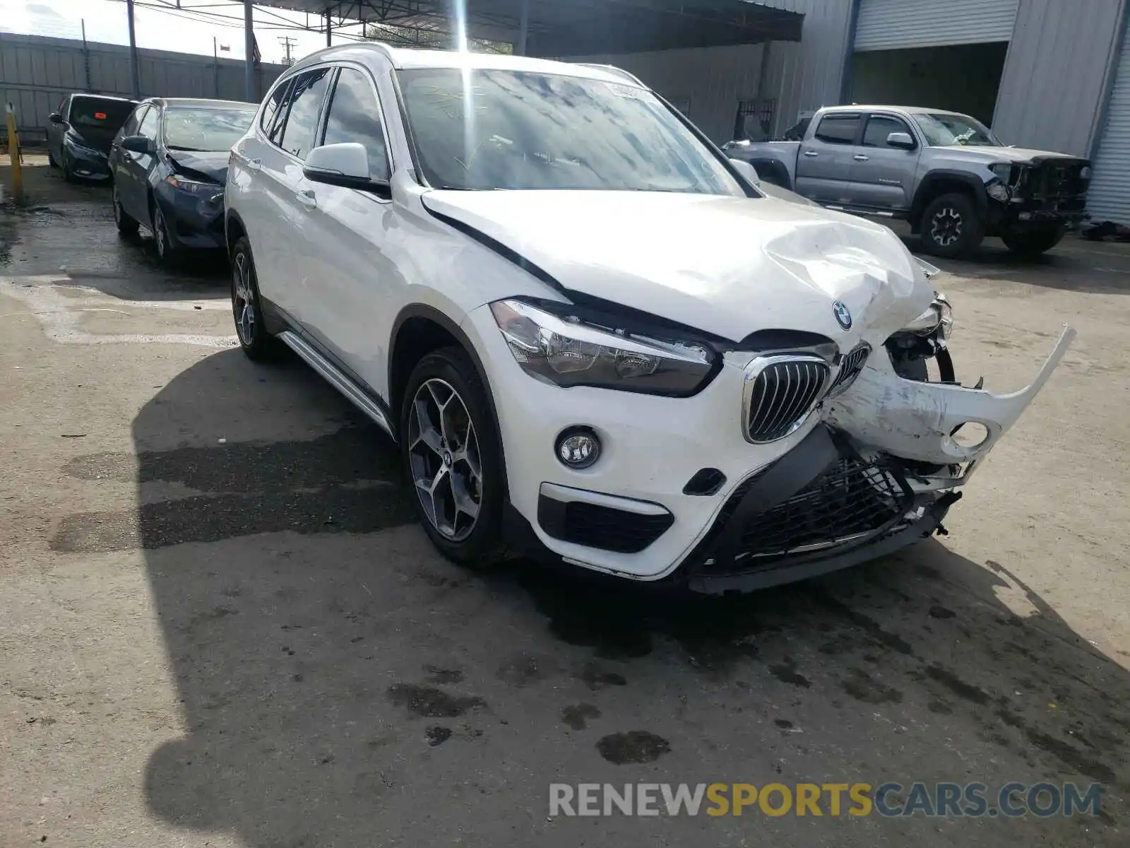 1 Photograph of a damaged car WBXHU7C54K5L09986 BMW X1 2019