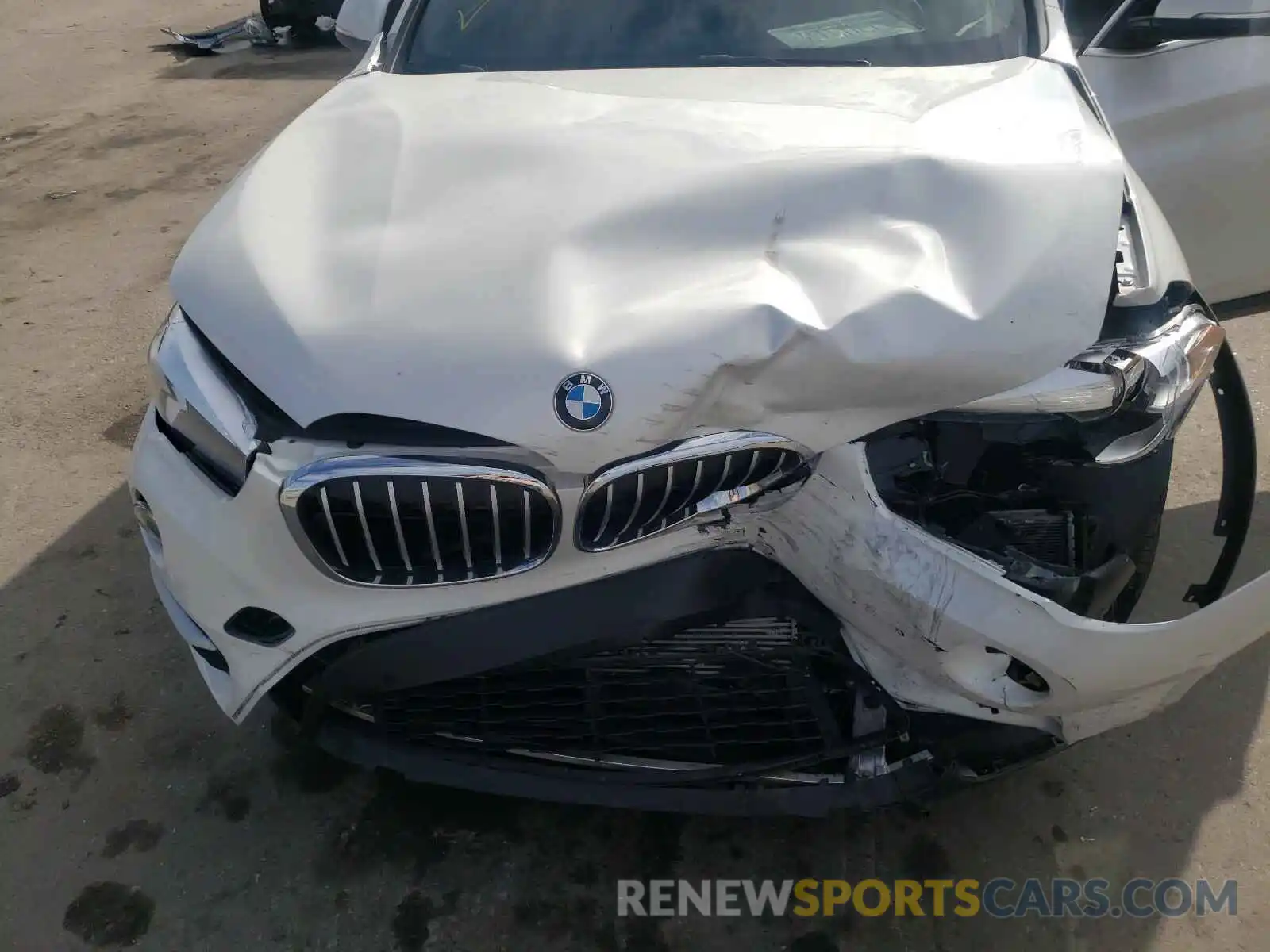 7 Photograph of a damaged car WBXHU7C54K5L09986 BMW X1 2019