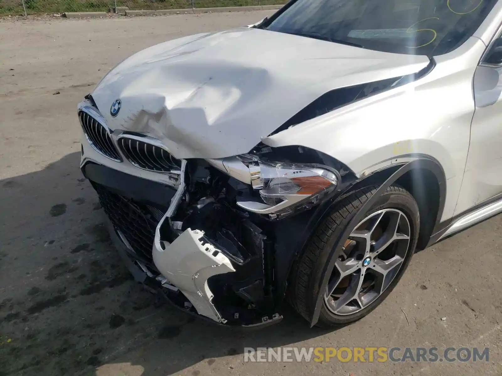 9 Photograph of a damaged car WBXHU7C54K5L09986 BMW X1 2019