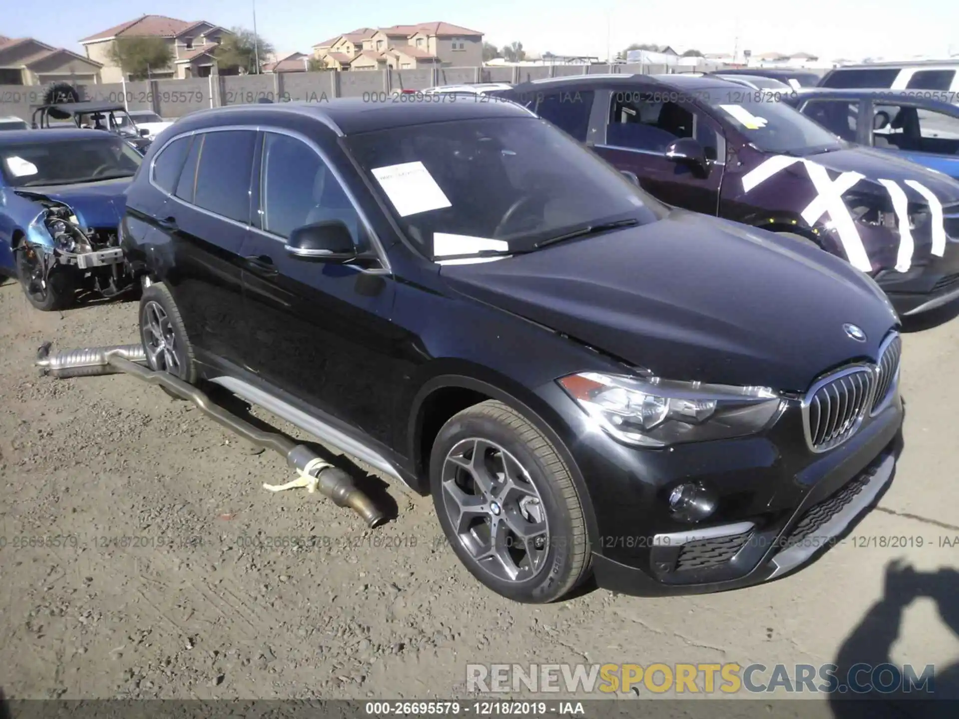 1 Photograph of a damaged car WBXHU7C54K5L11947 BMW X1 2019