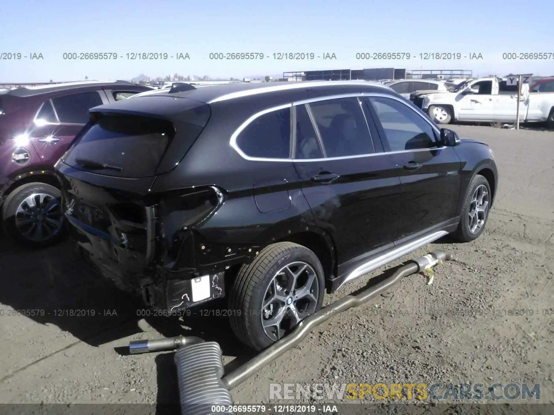 4 Photograph of a damaged car WBXHU7C54K5L11947 BMW X1 2019