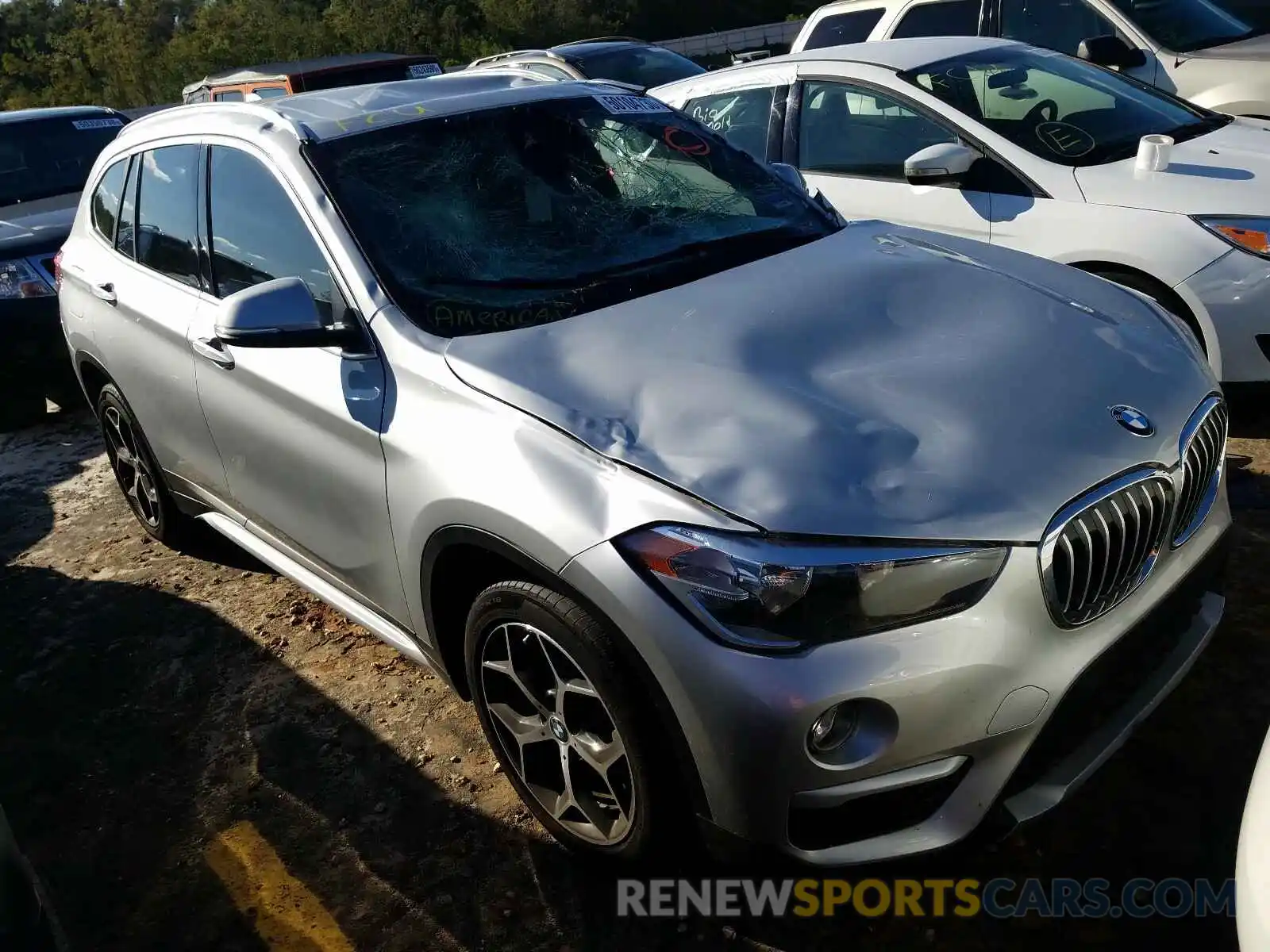 1 Photograph of a damaged car WBXHU7C55K5L09821 BMW X1 2019