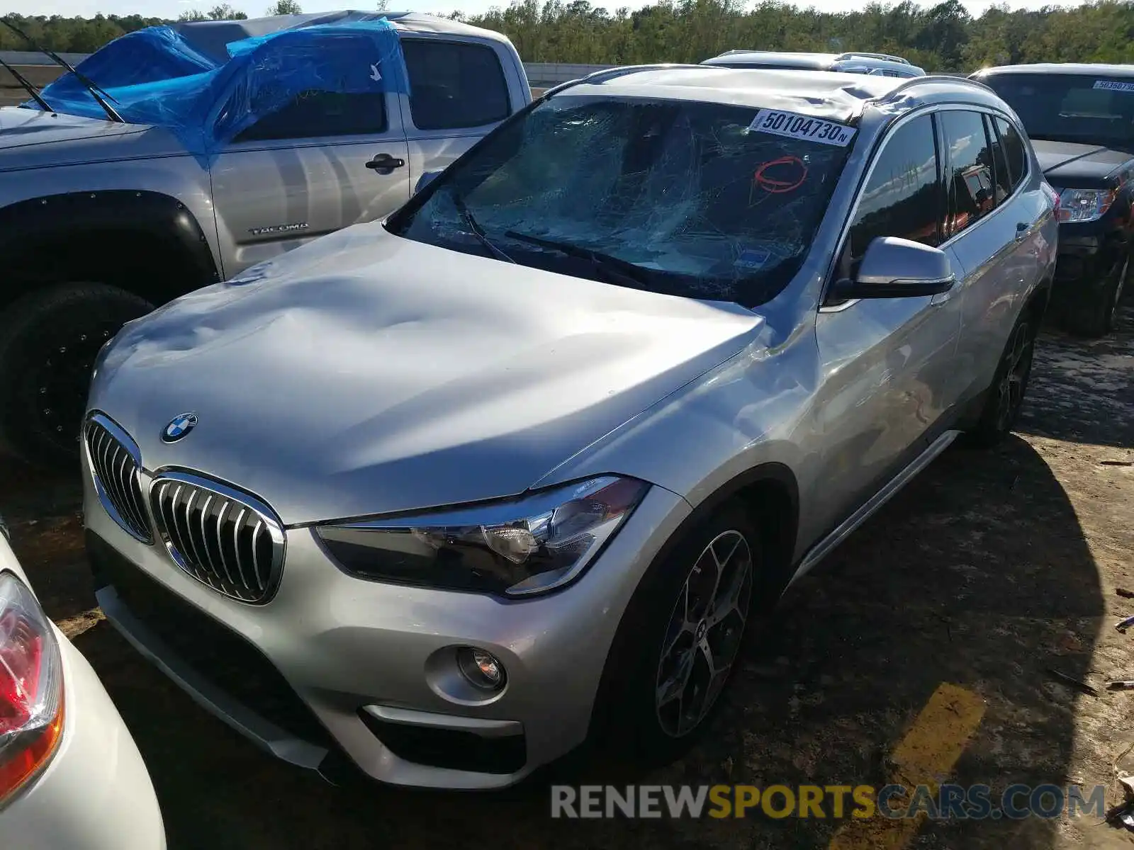 2 Photograph of a damaged car WBXHU7C55K5L09821 BMW X1 2019