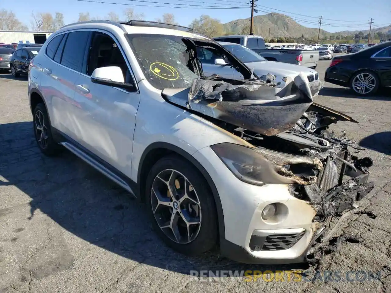 1 Photograph of a damaged car WBXHU7C56K3H44474 BMW X1 2019