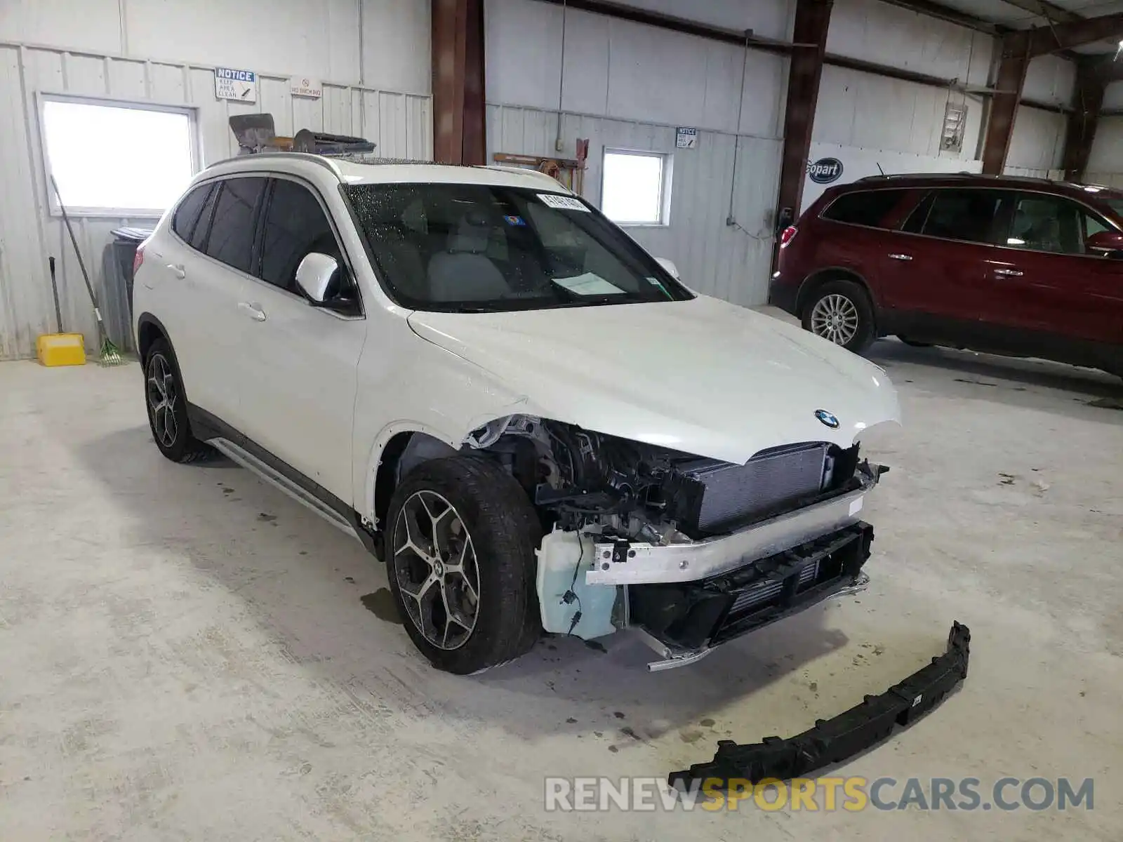 1 Photograph of a damaged car WBXHU7C56K3H44801 BMW X1 2019