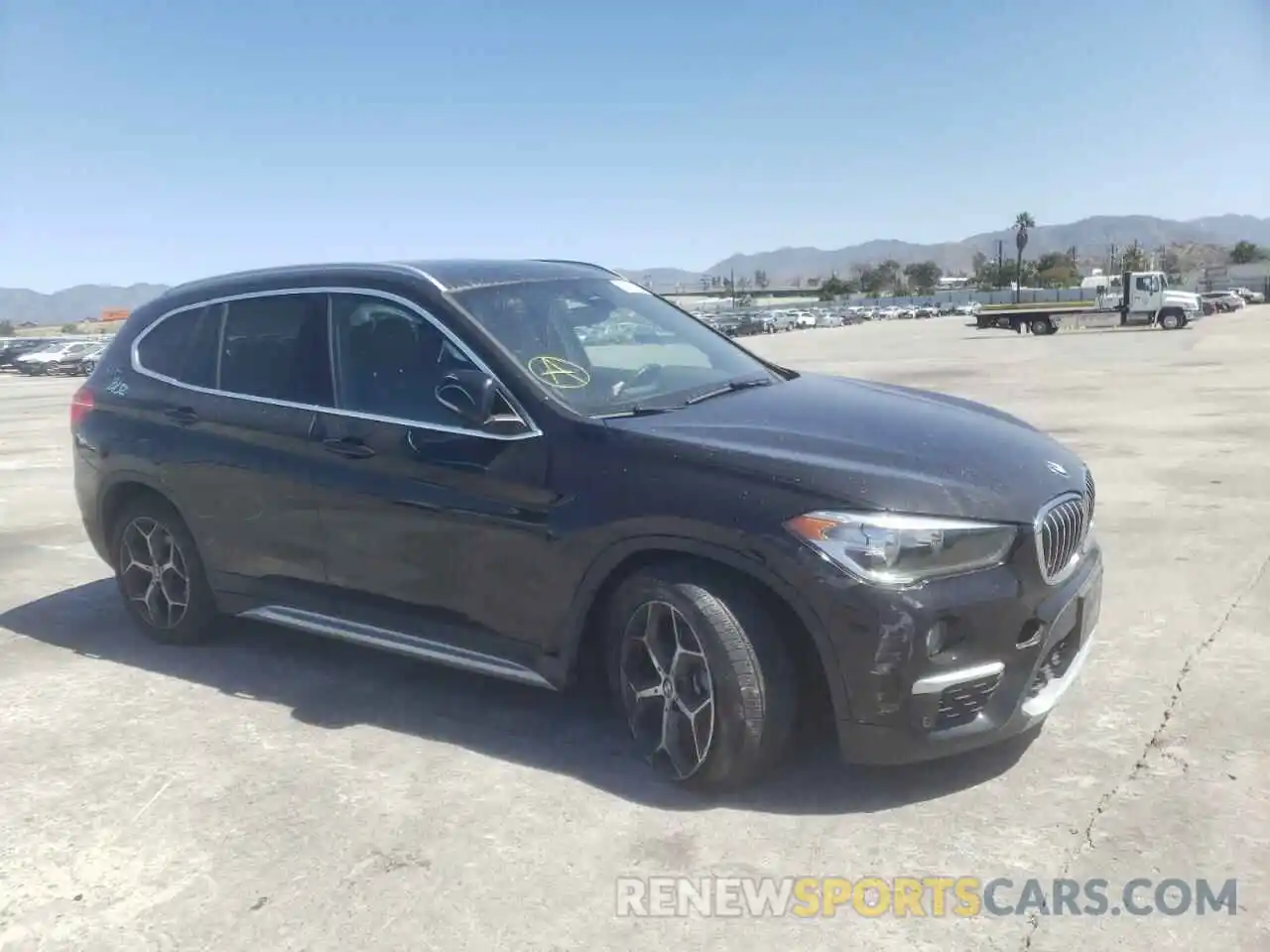 1 Photograph of a damaged car WBXHU7C56K5L10069 BMW X1 2019