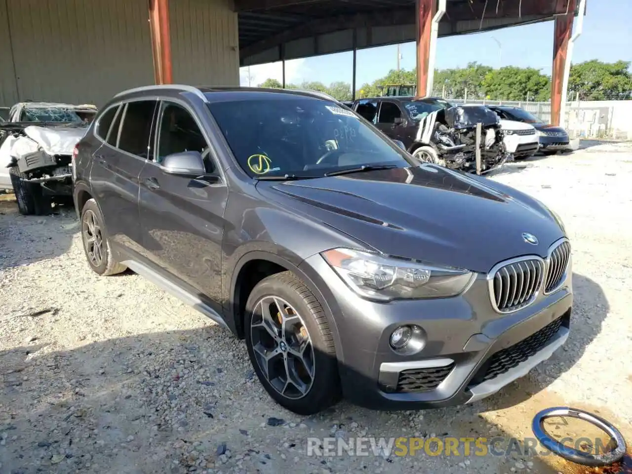 1 Photograph of a damaged car WBXHU7C56K5L11920 BMW X1 2019