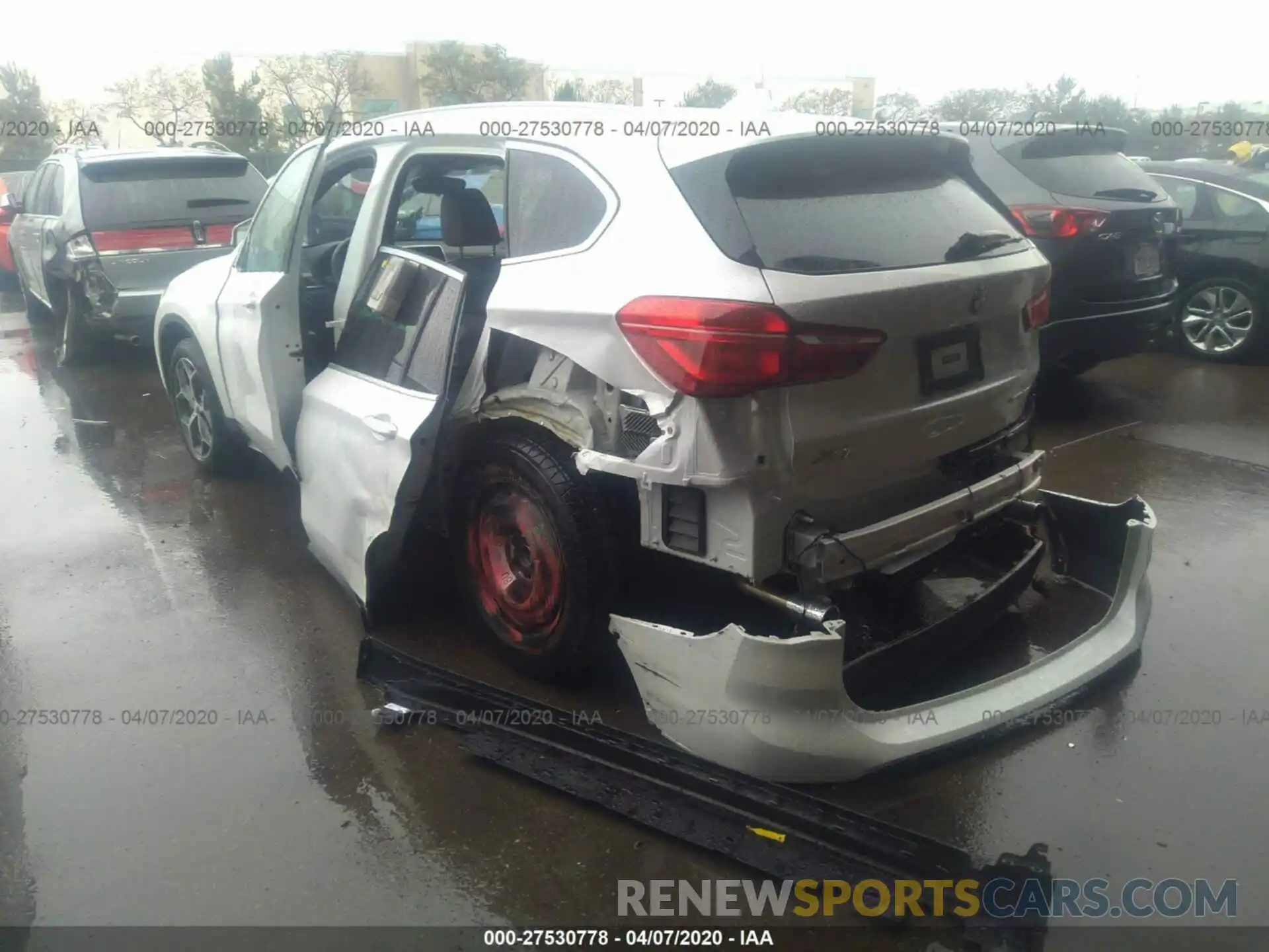 3 Photograph of a damaged car WBXHU7C56K5N18341 BMW X1 2019