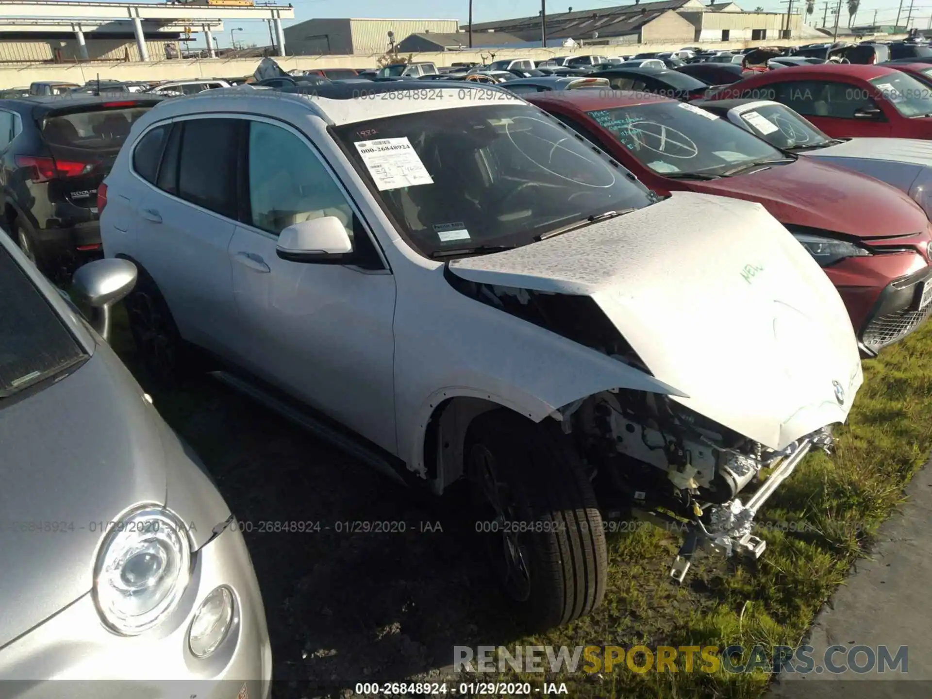 1 Photograph of a damaged car WBXHU7C57K5L10565 BMW X1 2019