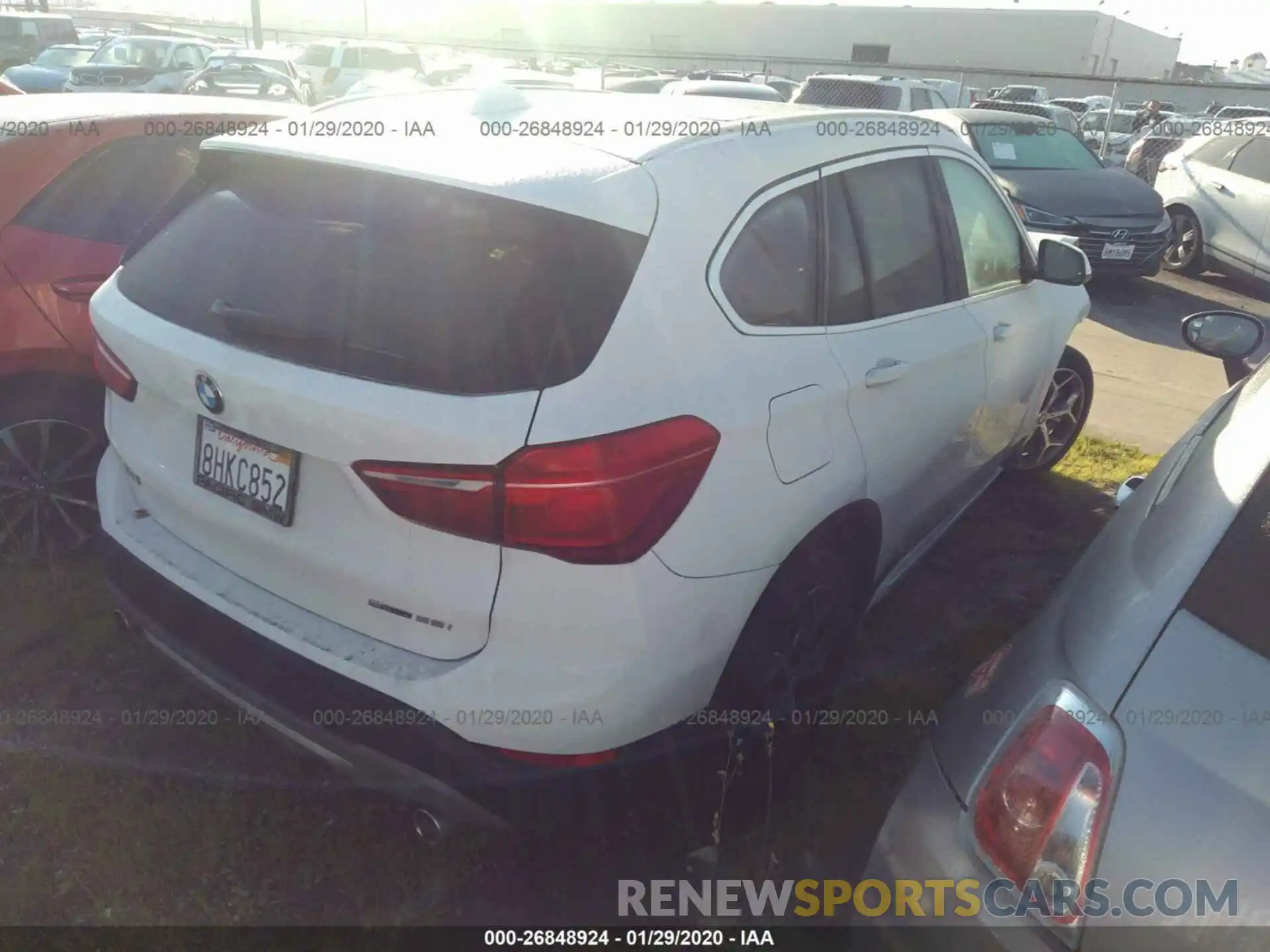 4 Photograph of a damaged car WBXHU7C57K5L10565 BMW X1 2019