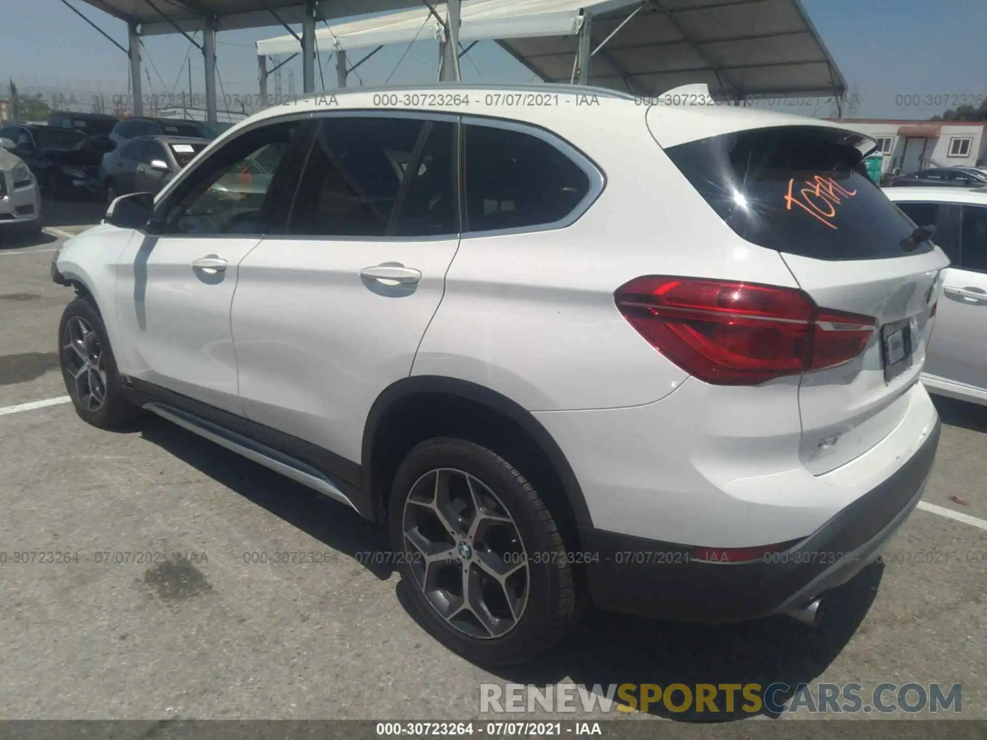 3 Photograph of a damaged car WBXHU7C57K5L10601 BMW X1 2019