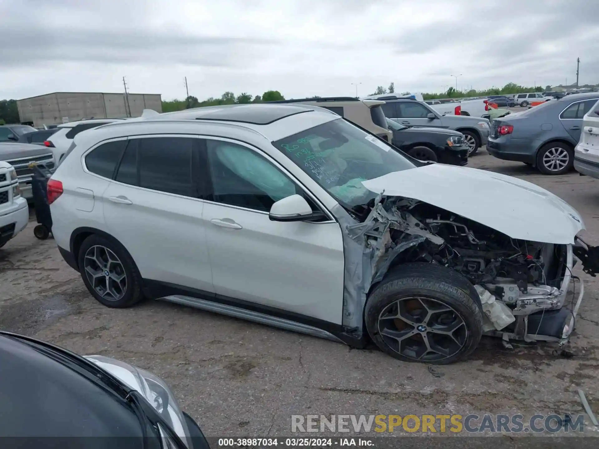 13 Photograph of a damaged car WBXHU7C57K5L10789 BMW X1 2019