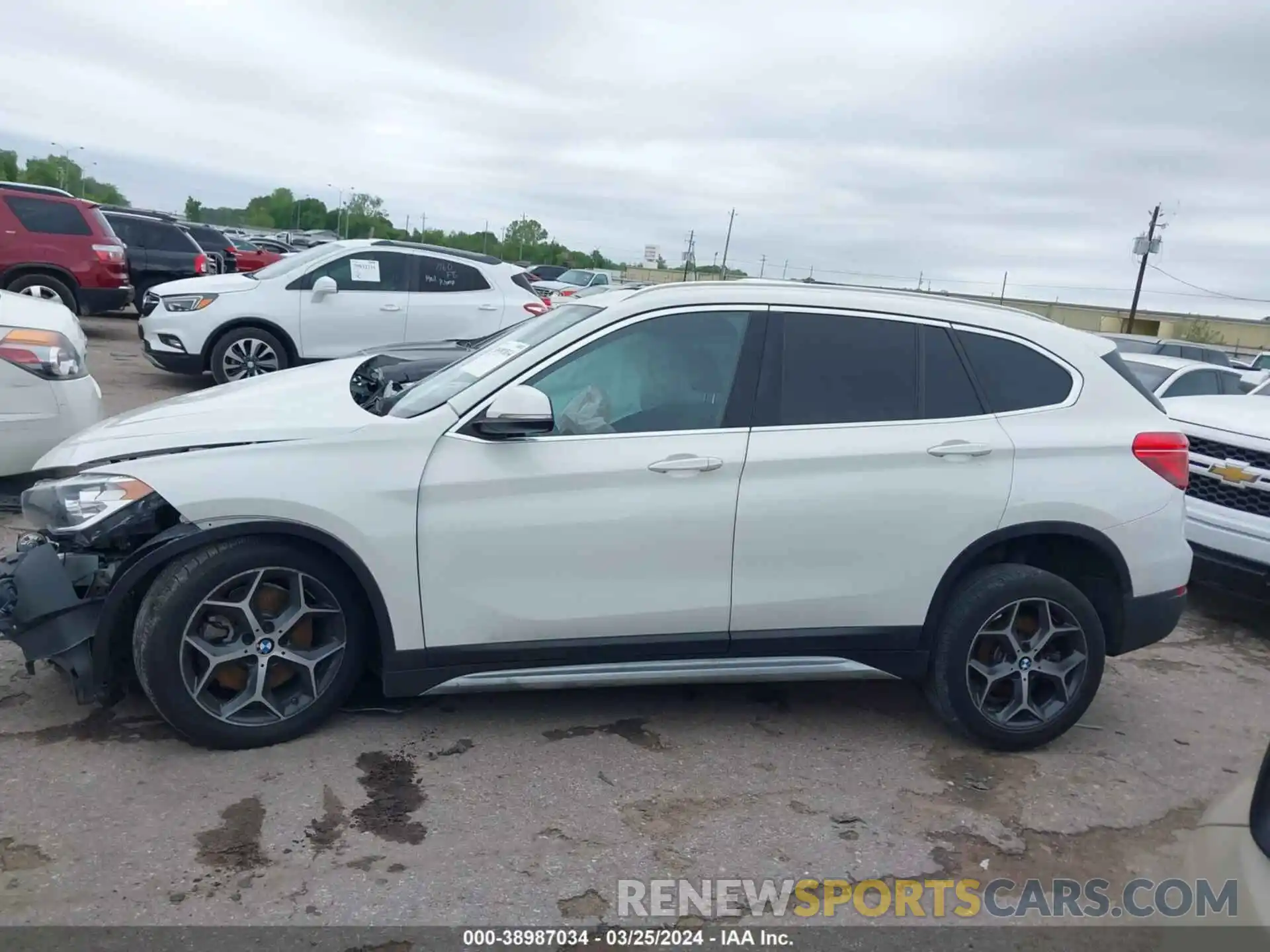 14 Photograph of a damaged car WBXHU7C57K5L10789 BMW X1 2019