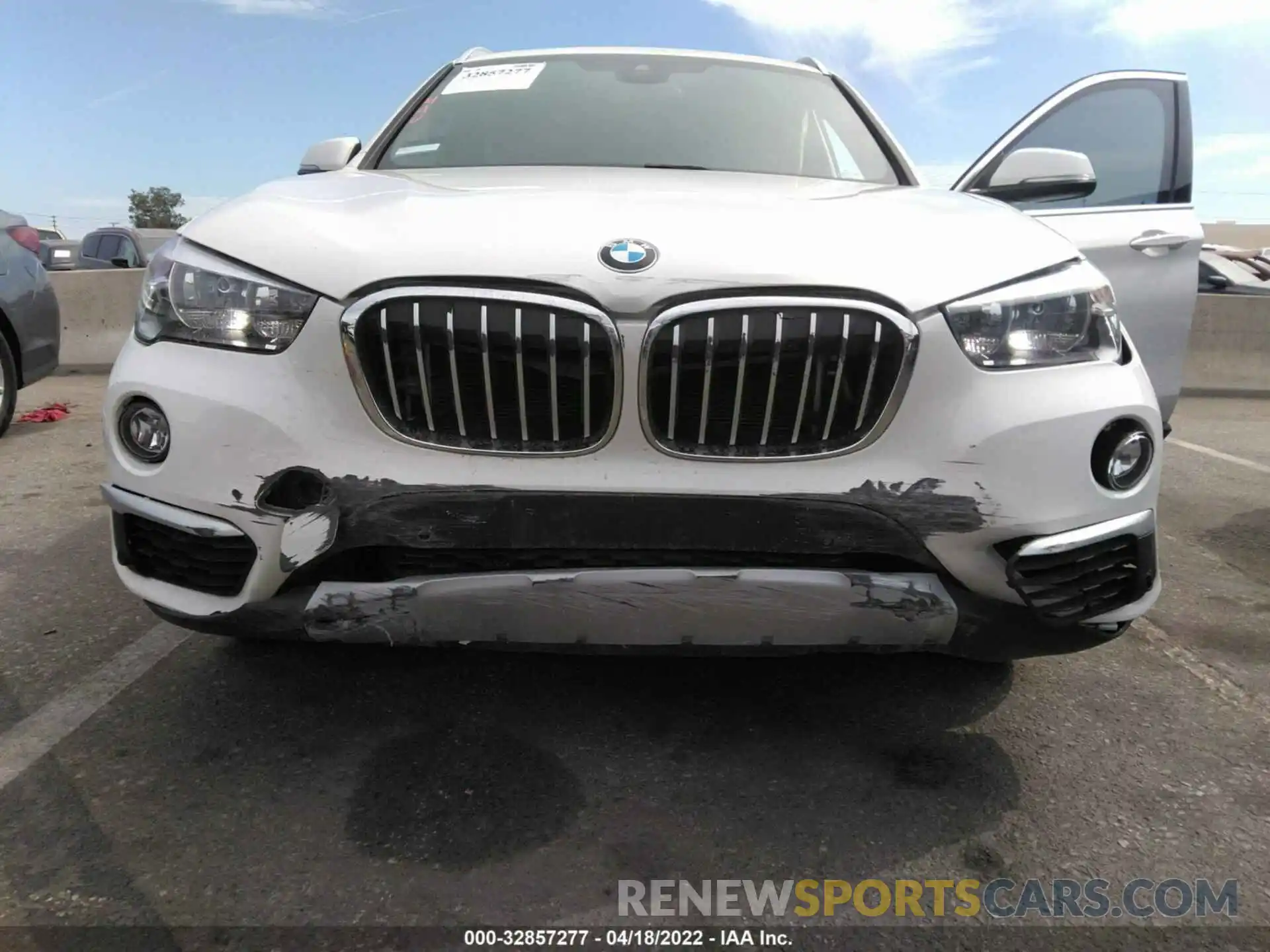 6 Photograph of a damaged car WBXHU7C57K5L12199 BMW X1 2019